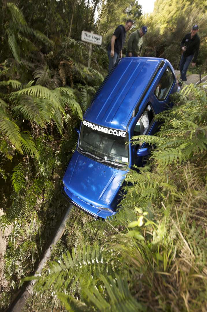 Go deep into New Zealand forest, hugging the steep tracks and unforgiving volcanic terrain.